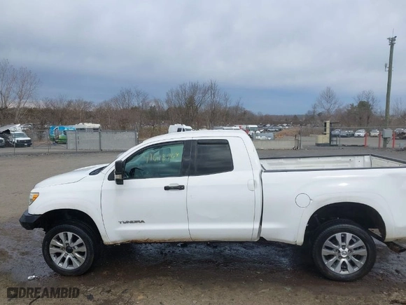 2012 Toyota Tundra 4WD Truck with VIN 5TFUM5F16CX036743, listed as a IAAI auction lot 41618964 with 134,413 mi miles. Bid and sale history available at carsss.com. Image 14.