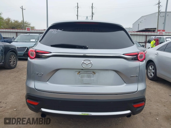 2023 Mazda CX-9 Carbon Edition with VIN JM3TCBDY7P0638506, listed as a IAAI auction lot 41889425 with 60,471 mi miles and . Bid and sale history available at carsss.com. Image 16.