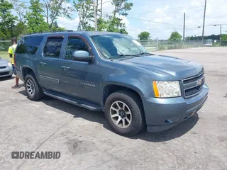 2010 Chevrolet Suburban LS z VIN 1GNUKHE38AR221668, wystawiony jako IAAI lot #42366991 z przebiegiem 182 269 mil mil oraz . Historia ofert i sprzedaży dostępna na DreamBid. Obrazek 1.