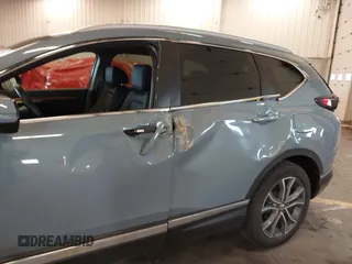 2022 Honda CR-V Touring with VIN 2HKRW2H94NH629730, listed as a IAAI auction lot 41677074 with 34,006 mi miles. Bid and sale history available at carsss.com. Image 6.