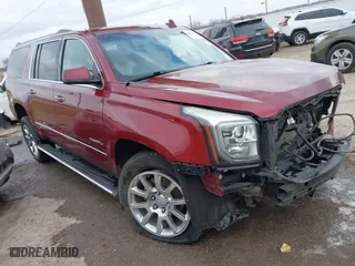 2016 GMC Yukon XL Denali with VIN 1GKS1HKJXGR453840, listed as a IAAI auction lot 41057135 with 105,469 mi miles. Bid and sale history available at carsss.com. Image 1.