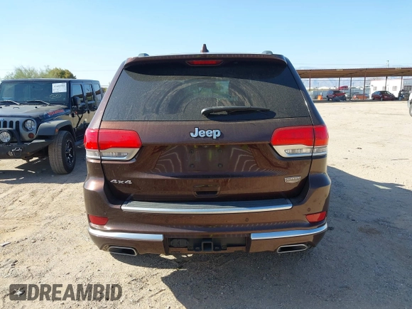 2015 Jeep Grand Cherokee Summit with VIN 1C4RJFJGXFC125131, listed as a IAAI auction lot 42475017 with 128,166 mi miles and . Bid and sale history available at DreamBid. Image 16.