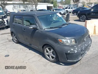 2009 Scion xB with VIN JTLKE50E091078423, listed as a IAAI auction lot 42139031 with 240,930 mi miles. Bid and sale history available at carsss.com. Image 1.