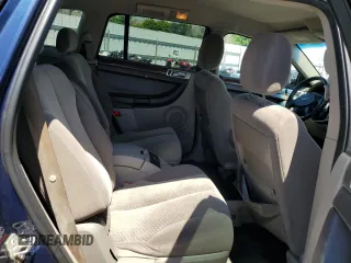 2004 Chrysler Pacifica z VIN 2C4GM684X4R511479, wystawiony jako Copart lot #57055155 z przebiegiem 182 041 mil mil oraz Szkoda całkowita • Salvage title. Historia ofert i sprzedaży dostępna na DreamBid. Obrazek 11.