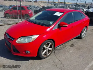 2013 Ford Focus SE with VIN 1FADP3F20DL266037, listed as a IAAI auction lot 42019852 with 160,549 mi miles. Bid and sale history available at carsss.com. Image 2.