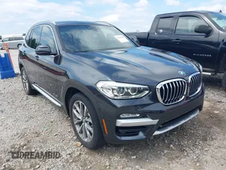2018 BMW X3 xDrive30i z VIN 5UXTR9C51JLD63858, wystawiony jako IAAI lot #42161120 z przebiegiem 55 073 mil mil oraz . Historia ofert i sprzedaży dostępna na DreamBid. Obrazek 1.