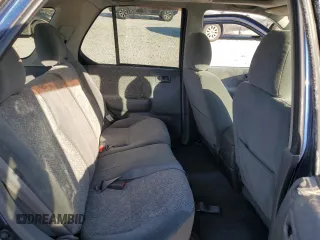 2002 Isuzu Rodeo S with VIN 4S2CK58W124307433, listed as a Copart auction lot 75447074 with 129,163 mi miles and Salvage title. Bid and sale history available at DreamBid. Image 10.