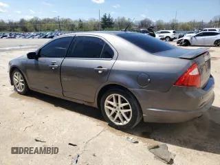 2012 Ford Fusion SEL with VIN 3FAHP0JG8CR217039, listed as a Copart auction lot 52078065 with 153,506 mi miles and Salvage Title. Bid and sale history available at carsss.com. Image 2.