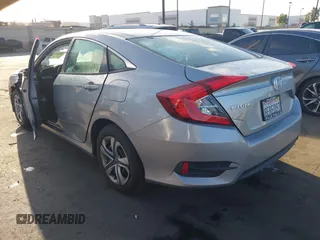 2018 Honda Civic LX with VIN 2HGFC2F58JH571072, listed as a IAAI auction lot 41684450 with 66,032 mi miles and . Bid and sale history available at carsss.com. Image 3.