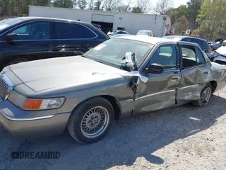 2001 Mercury Grand Marquis LS with VIN 2MEFM75W21X664449, listed as a IAAI auction lot 41898463 with 290,047 mi miles and . Bid and sale history available at DreamBid. Image 14.