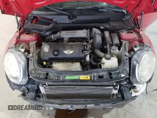 2011 MINI Hardtop z VIN WMWSU3C58BT095542, wystawiony jako Copart lot #57474055 z przebiegiem 41 490 mil mil oraz Szkoda całkowita • Salvage title. Historia ofert i sprzedaży dostępna na DreamBid. Obrazek 11.