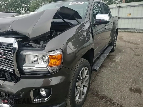 2019 GMC Canyon 4WD Denali with VIN 1GTG6EENXK1200430, listed as a Copart auction lot 65524334 with 54,813 mi miles and Salvage Title. Bid and sale history available at carsss.com. Image 11.