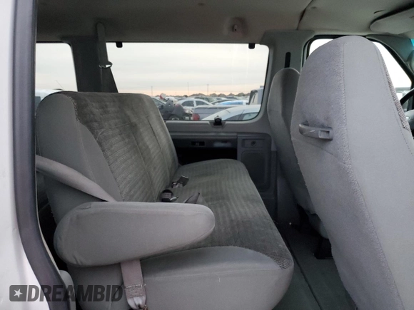 2003 Ford Econoline Passenger XL z VIN 1FBSS31L63HA17960, wystawiony jako Copart lot #84592684 z przebiegiem 80 690 mil mil oraz Czysty tytuł • Clean title. Historia ofert i sprzedaży dostępna na DreamBid. Obrazek 11.