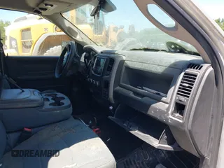 2014 Ram 2500 Tradesman z VIN 3C6TR5CT7EG186099, wystawiony jako IAAI lot #42317585 z przebiegiem 309 687 mil mil oraz . Historia ofert i sprzedaży dostępna na DreamBid. Obrazek 5.