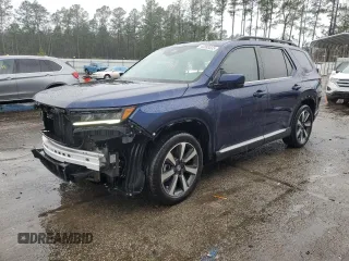 2024 Honda Pilot Touring z VIN 5FNYG2H75RB013952, wystawiony jako Copart lot #42283635 z przebiegiem 14 790 mil mil oraz Szkoda całkowita • Salvage title. Historia ofert i sprzedaży dostępna na DreamBid. Obrazek 1.