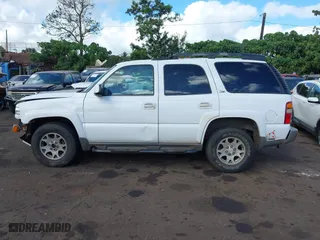 2003 Chevrolet Tahoe Z71 with VIN 1GNEK13T53R109296, listed as a IAAI auction lot 41659341 with 223,479 mi miles. Bid and sale history available at carsss.com. Image 14.