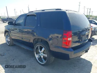 2007 Chevrolet Tahoe LTZ with VIN 1GNFC13017R285839, listed as a IAAI auction lot 42002091 with 210,039 mi miles and . Bid and sale history available at DreamBid. Image 3.