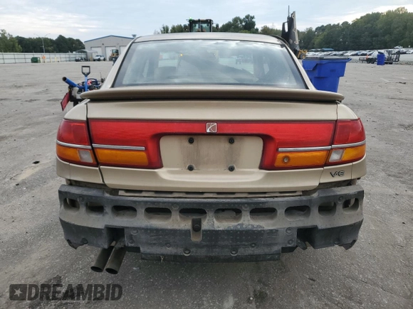 2001 Saturn LS z VIN 1G8JW54R11Y557232, wystawiony jako Copart lot #74638904 z przebiegiem 158 729 mil mil oraz Szkody całkowita. Historia ofert i sprzedaży dostępna na DreamBid. Obrazek 6.