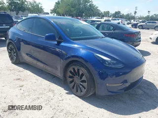 2023 Tesla Model Y Performance with VIN 7SAYGDEF9PF582908, listed as a IAAI auction lot 41930957 with 52,857 mi miles and . Bid and sale history available at DreamBid. Image 1.
