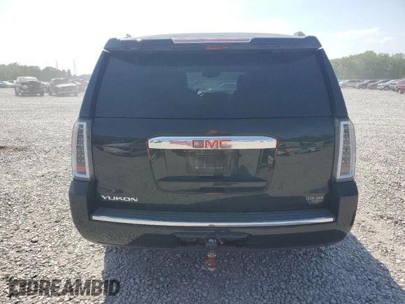 2015 GMC Yukon Denali z VIN 1GKS2CKJ8FR132636, wystawiony jako Copart lot #53567045 z przebiegiem 148 997 mil mil oraz Szkoda całkowita • Salvage title. Historia ofert i sprzedaży dostępna na DreamBid. Obrazek 6.