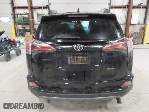 2018 Toyota RAV4 XLE with VIN 2T3RFREV0JW715761, listed as a IAAI auction lot 41881863 with 67,534 mi miles and . Bid and sale history available at DreamBid. Image 16.