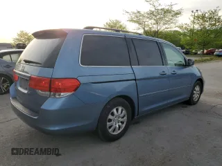 2009 Honda Odyssey EX-L with VIN 5FNRL38759B004710, listed as a Copart auction lot 54210425 with 171,674 mi miles and Salvage Title. Bid and sale history available at DreamBid. Image 3.