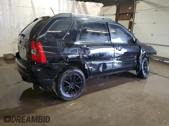 2009 Kia Sportage LX with VIN KNDJF724797567810, listed as a Copart auction lot 42012625 with Not Provided miles and Salvage Title. Bid and sale history available at DreamBid. Image 3.