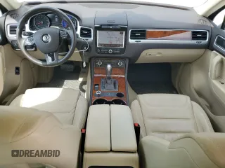 2013 Volkswagen Touareg Lux with VIN WVGEF9BP9DD008658, listed as a Copart auction lot 52585925 with 93,369 mi miles and Salvage Title. Bid and sale history available at DreamBid. Image 8.