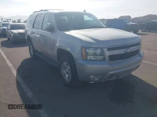 2009 Chevrolet Tahoe 1LT z VIN 1GNFK23049R133033, wystawiony jako IAAI lot #41140193 z przebiegiem 328 375 mil mil oraz . Historia ofert i sprzedaży dostępna na DreamBid. Obrazek 1.