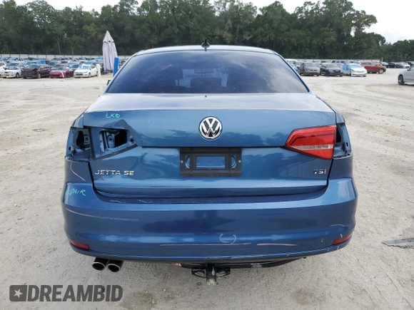 2015 Volkswagen Jetta SE with VIN 3VWD17AJ4FM308841, listed as a Copart auction lot 63437565 with 156,974 mi miles and Salvage title. Bid and sale history available at DreamBid. Image 6.