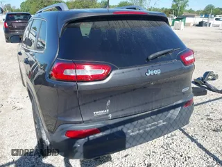 2016 Jeep Cherokee Latitude z VIN 1C4PJLCB5GW264607, wystawiony jako IAAI lot #42275637 z przebiegiem 64 264 mil mil oraz . Historia ofert i sprzedaży dostępna na DreamBid. Obrazek 16.
