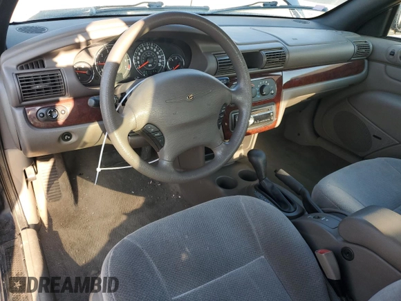 2001 Chrysler Sebring with VIN 1C3EL45U61N654025, listed as a Copart auction lot 71250534 with 125,335 mi miles and Clean Title. Bid and sale history available at DreamBid. Image 8.