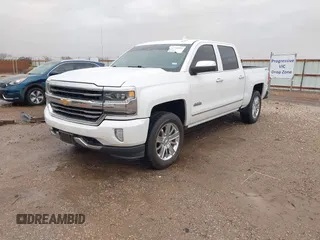 2018 Chevrolet Silverado 1500 High Country with VIN 3GCUKTEC1JG331991, listed as a IAAI auction lot 41718084 with 120,924 mi miles and . Bid and sale history available at DreamBid. Image 17.