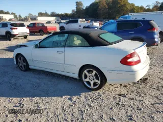 2009 Mercedes-Benz CLK-Class 3.5L with VIN WDBTK56FX9T108328, listed as a Copart auction lot 74586884 with 49,660 mi miles and Salvage Title. Bid and sale history available at carsss.com. Image 2.