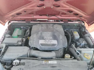 2012 Jeep Wrangler Unlimited Sport z VIN 1C4BJWDG7CL214633, wystawiony jako Copart lot #54547655 z przebiegiem 80 720 mil mil oraz Szkoda całkowita • Salvage title. Historia ofert i sprzedaży dostępna na DreamBid. Obrazek 12.