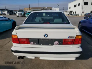 1991 BMW M5 z VIN WBSHD9319MBK05979, wystawiony jako Copart lot #85645534 z przebiegiem 138 219 mil mil oraz Tytuł czysty. Historia ofert i sprzedaży dostępna na DreamBid. Obrazek 6.