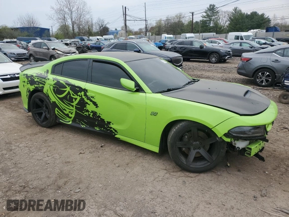 2019 Dodge Charger Scat Pack with VIN 2C3CDXGJ4KH662773, listed as a Copart auction lot 53092825 with 55,644 mi miles and Salvage title. Bid and sale history available at DreamBid. Image 4.