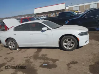 2021 Dodge Charger SXT with VIN 2C3CDXBG5MH605867, listed as a IAAI auction lot 41682336 with 56,660 mi miles and . Bid and sale history available at DreamBid. Image 13.