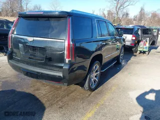 2016 Cadillac Escalade Premium Collection with VIN 1GYS4CKJXGR266873, listed as a IAAI auction lot 41647399 with 153,553 mi miles. Bid and sale history available at carsss.com. Image 4.