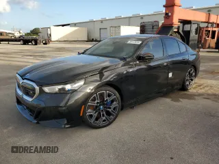 2024 BMW i5 M60 z VIN WBY43FK00RCP12947, wystawiony jako Copart lot #79117974 z przebiegiem Nie podano mil oraz Szkody całkowita. Historia ofert i sprzedaży dostępna na DreamBid. Obrazek 1.