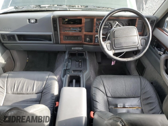 1995 Jeep Cherokee with VIN 1J4FN78SXSL617511, listed as a Copart auction lot 44650885 with 42,598 mi miles and Salvage title. Bid and sale history available at DreamBid. Image 8.