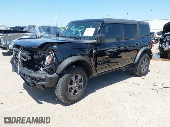 2024 Ford Bronco Big Bend z VIN 1FMDE7BH5RLA53797, wystawiony jako IAAI lot #41920749 z przebiegiem 13 399 mil mil oraz . Historia ofert i sprzedaży dostępna na DreamBid. Obrazek 2.