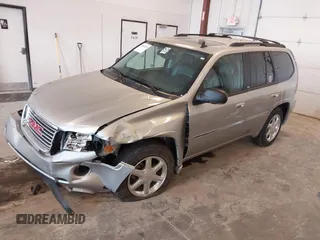 2007 GMC Envoy SLE z VIN 1GKDT13S572152757, wystawiony jako IAAI lot #42095239 z przebiegiem 50 510 mil mil oraz . Historia ofert i sprzedaży dostępna na DreamBid. Obrazek 2.
