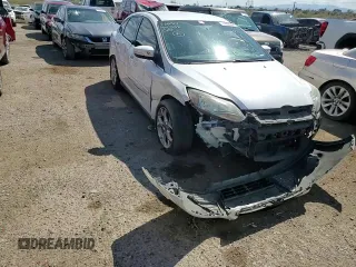 2014 Ford Focus Titanium with VIN 1FADP3J26EL132223, listed as a Copart auction lot 71490004 with 131,233 mi miles and Salvage Title. Bid and sale history available at DreamBid. Image 11.