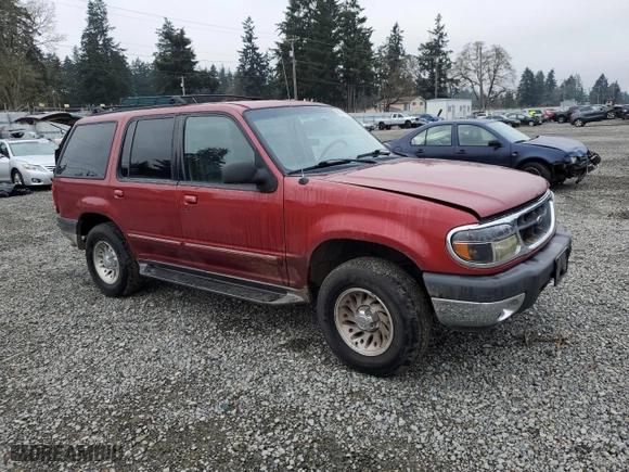 2000 Ford Explorer XLT with VIN 1FMDU73EXYZA10334, listed as a Copart auction lot 88321125 with 165,673 mi miles and Salvage Title. Bid and sale history available at carsss.com. Image 4.