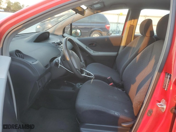 2009 Toyota Yaris with VIN JTDKT903995232885, listed as a Copart auction lot 71397904 with 112,804 mi miles and Salvage Title. Bid and sale history available at carsss.com. Image 7.