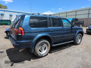 2001 Mitsubishi Montero ES z VIN JA4MT21H81P001568, wystawiony jako Copart lot #57666105 z przebiegiem 203 228 mil mil oraz Szkoda całkowita • Salvage title. Historia ofert i sprzedaży dostępna na DreamBid. Obrazek 3.