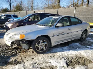 2002 Pontiac Grand Am GT1 with VIN 1G2NV52E52M626348, listed as a Copart auction lot 87703175 with 91,215 mi miles and Salvage Title. Bid and sale history available at carsss.com. Image 1.
