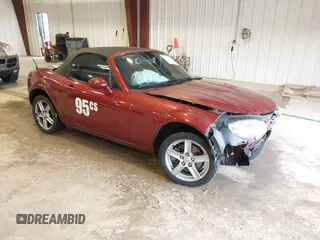 2007 Mazda MX-5 Miata Sport z VIN JM1NC25F970132299, wystawiony jako IAAI lot #41622791 z przebiegiem 72 392 mil mil oraz . Historia ofert i sprzedaży dostępna na DreamBid. Obrazek 1.