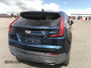 2021 Cadillac XT4 FWD Premium Luxury with VIN 1GYFZCR48MF004009, listed as a IAAI auction lot 41956723 with 82,483 mi miles. Bid and sale history available at carsss.com. Image 16.